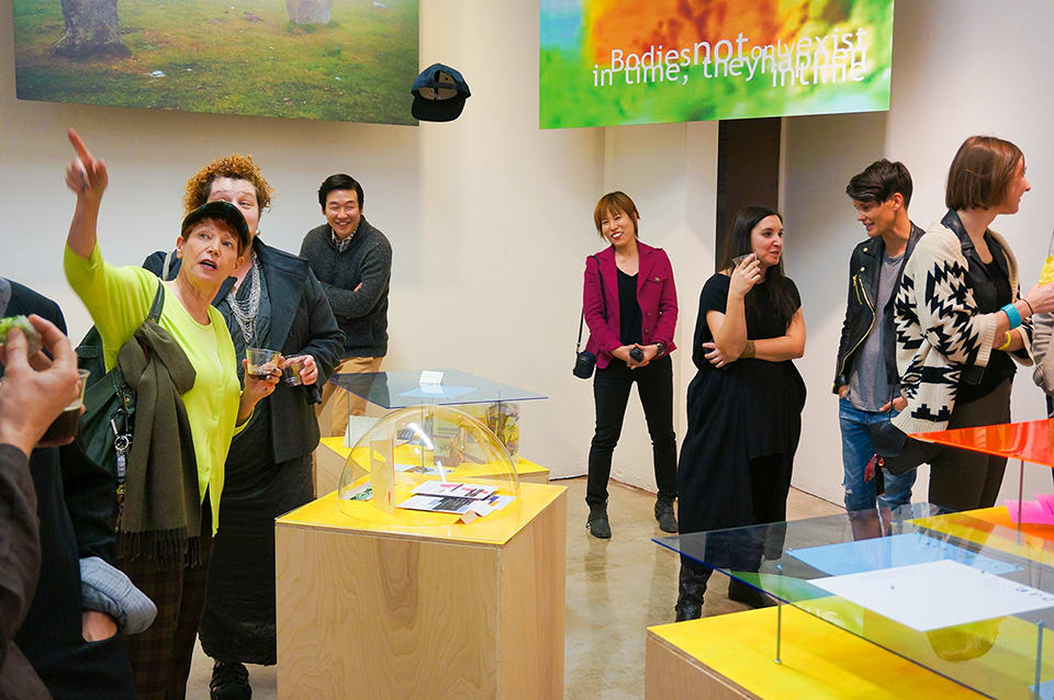 People milling about a gallery